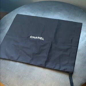 Brand new large authentic Chanel dust bag with string,never been used.Rare size!